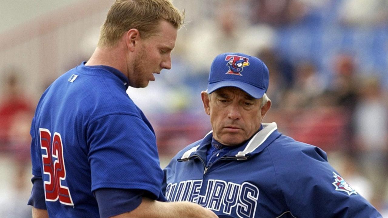 Buck Martinez as manager with Roy Halladay